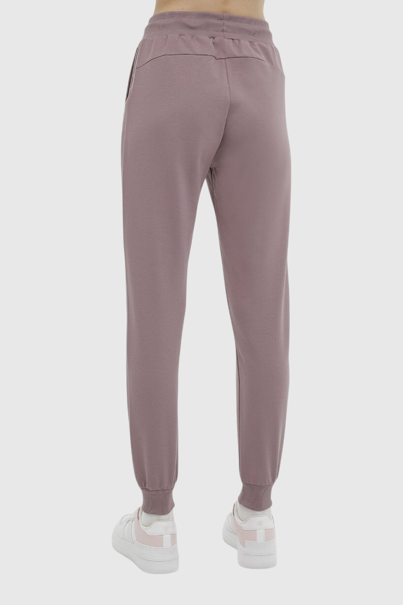 Sporline Lumberjack pastel mor renkli, jogger kesim, polyester karışımlı kadın eşofman altı arka görünümü
