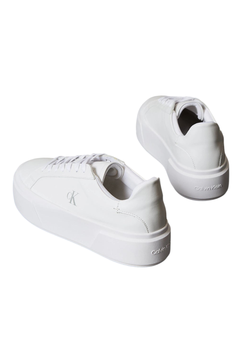 Sporline Calvin Klein beyaz deri kadın sneaker, kalın tabanlı ve yan kısmında CK logolu şık tasarım.
