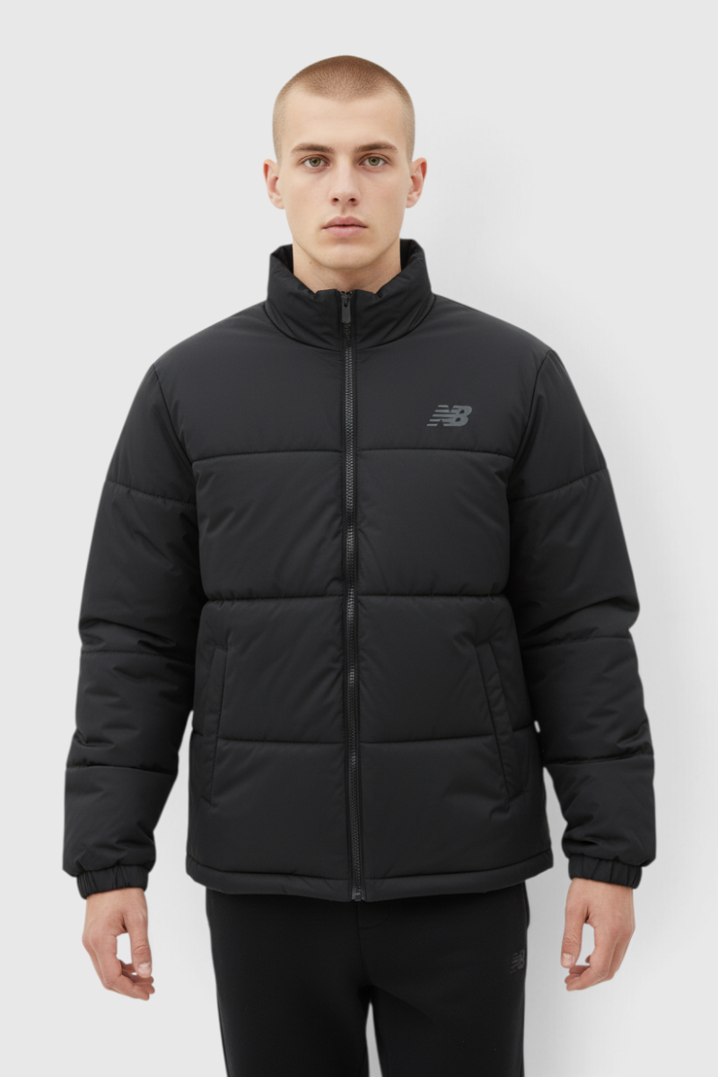Sporline New Balance erkek siyah şişme ceket, dik yaka ve fermuarlı tasarım, regular kesim, %100 tekstil malzeme