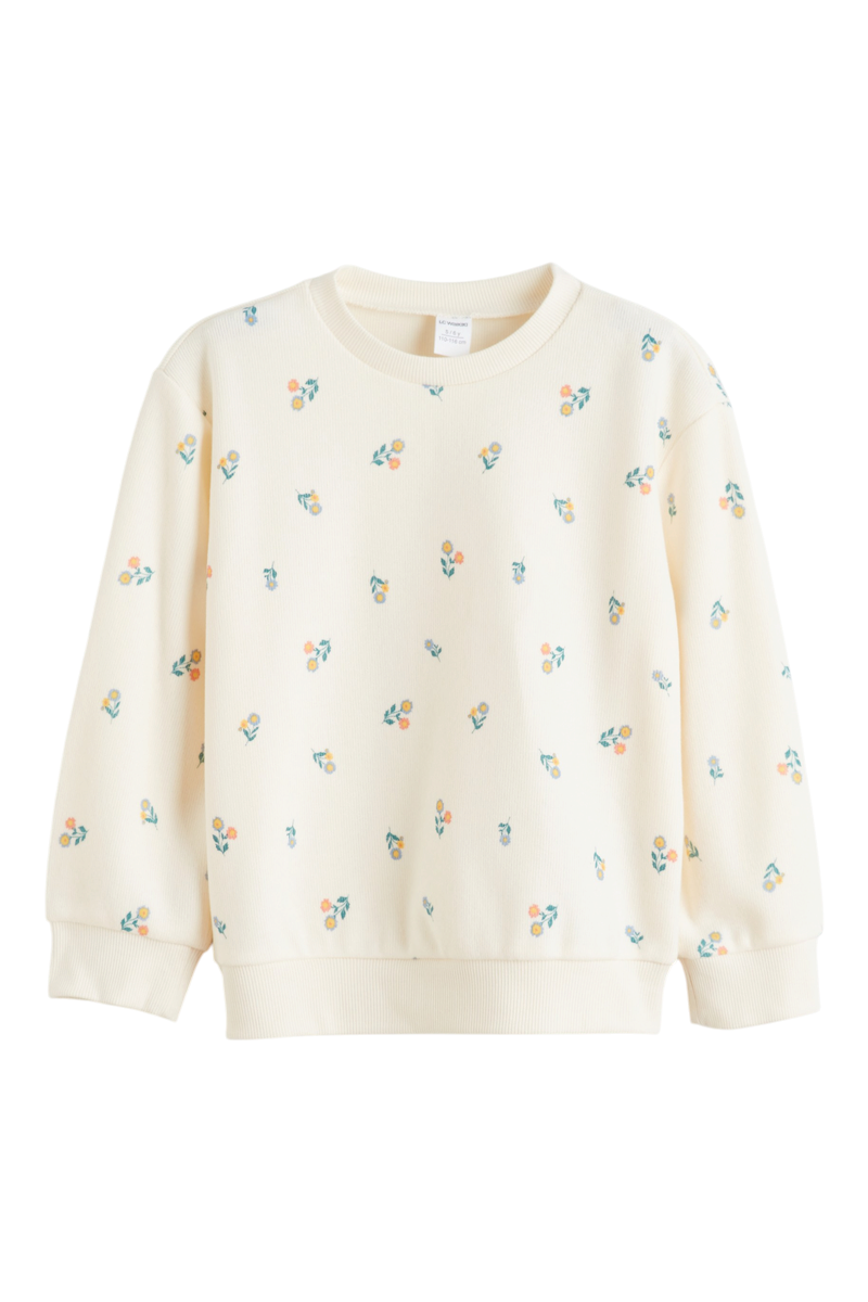 Sporline LC Waikiki çocuk sweatshirt, krem rengi zemin üzerinde minik çiçek desenli, pamuklu uzun kollu bisiklet yaka