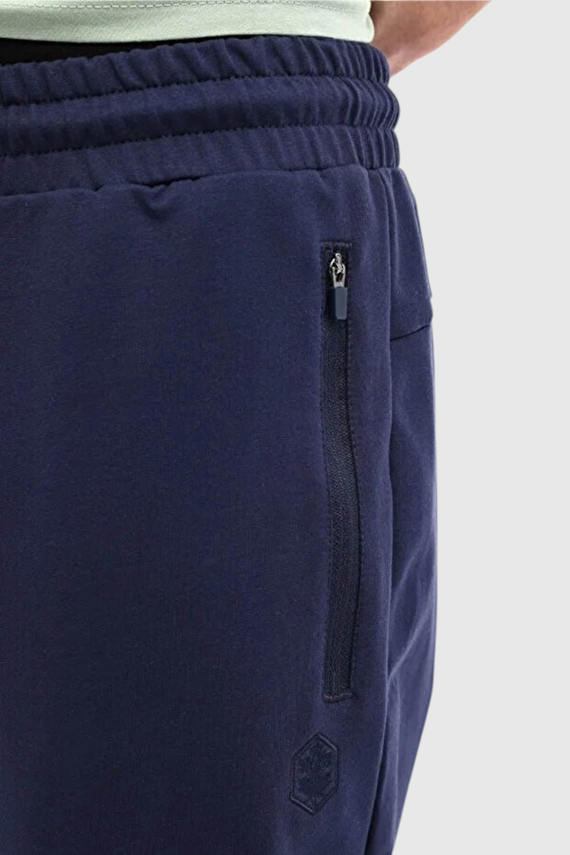 Sporline Lumberjack lacivert erkek jogger eşofman altı, fermuarlı yan cep detayı ve regular kesim tasarımı.