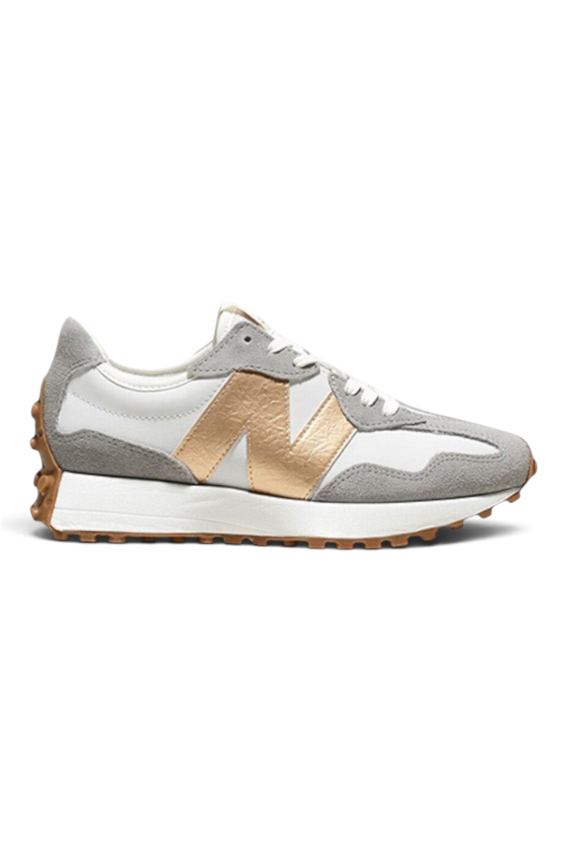 Sporline New Balance W3279NT kadın spor ayakkabı, gri süet ve beyaz detaylı, yan tarafında altın rengi N logosu.