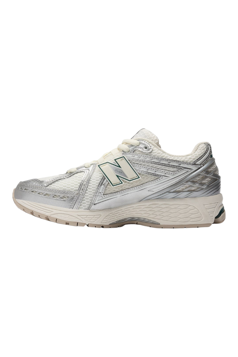 Sporline New Balance M1906REE unisex gri ve metalik detaylı spor ayakkabı, yan profil görünümü
