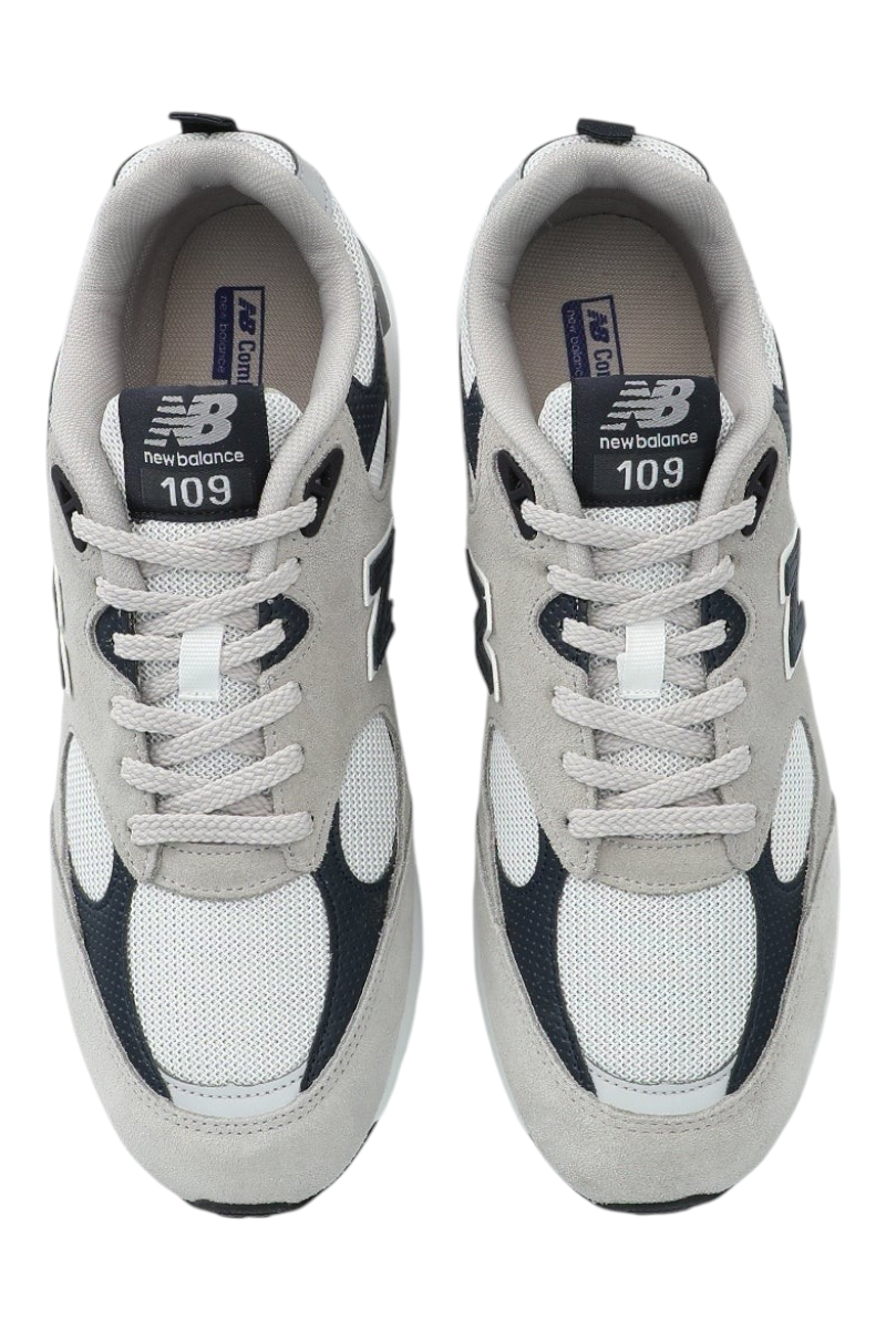 Sporline New Balance MS109GNV gri ve beyaz renkli, süet ve file detaylı erkek günlük spor ayakkabı üstten görünüm