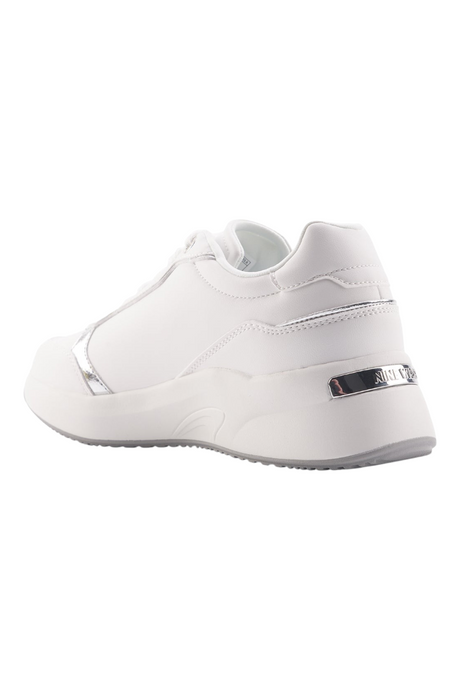 Sporline Nine West 4P beyaz PU kadın sneaker, topuk kısmında gümüş detaylı şık ve modern günlük spor ayakkabı