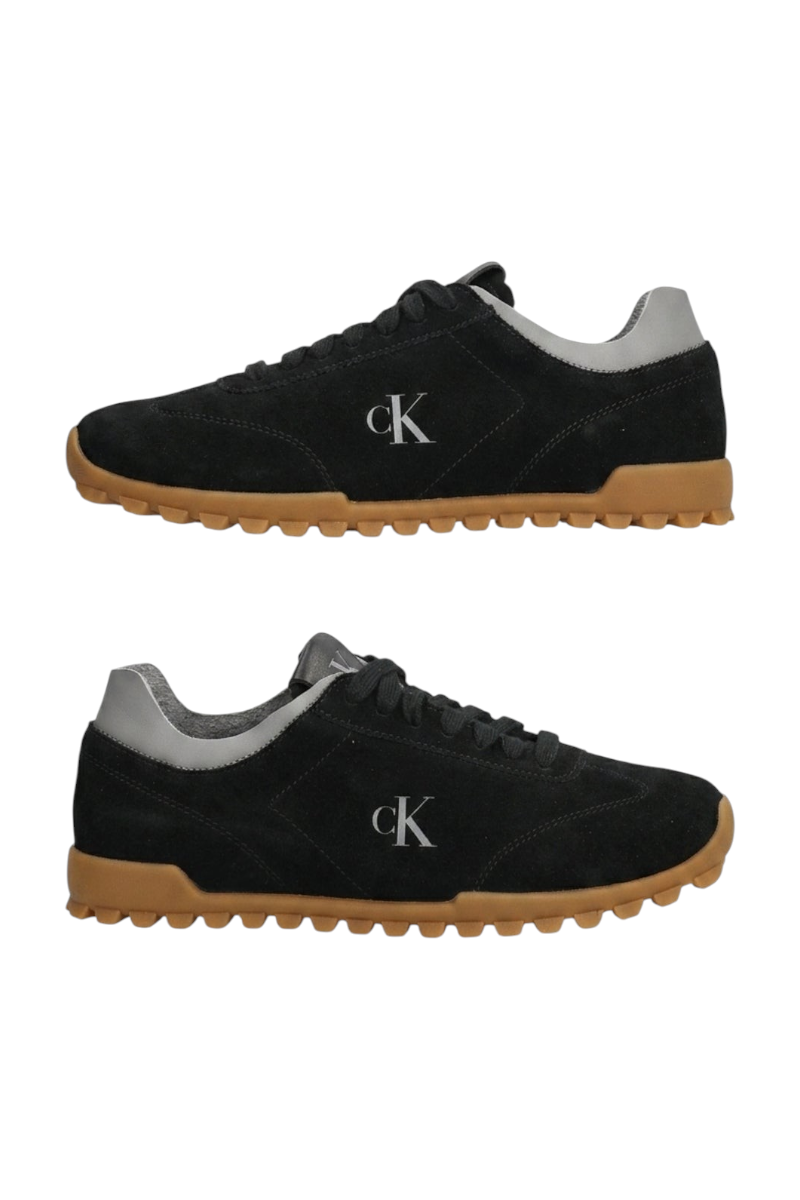 Sporline Calvin Klein siyah süet kadın sneaker, yan tarafta ck logolu ve kahverengi tırtıklı tabanlı spor ayakkabı.