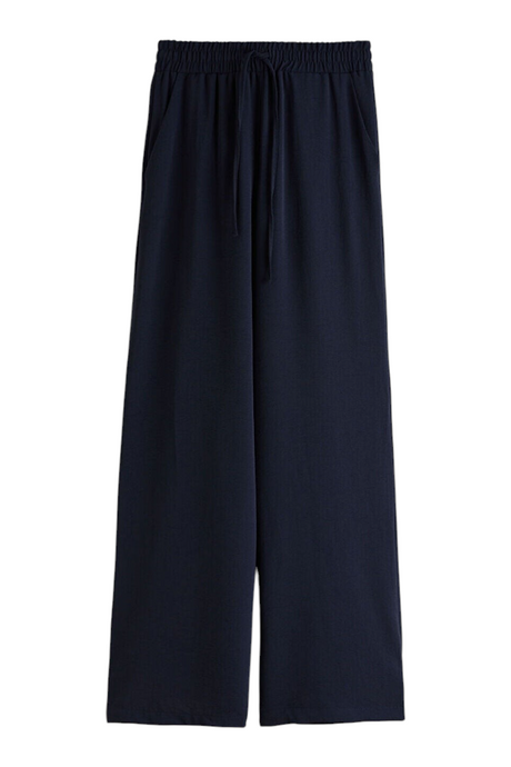 Sporline LC Waikiki koyu lacivert renkli, beli lastikli ve bağcıklı, %100 polyester rahat kadın pantolon