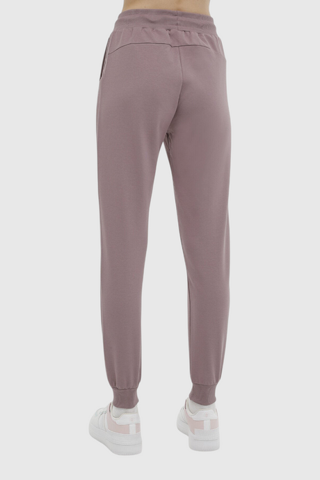 Sporline Lumberjack pastel mor renkli, jogger kesim, polyester karışımlı kadın eşofman altı arka görünümü