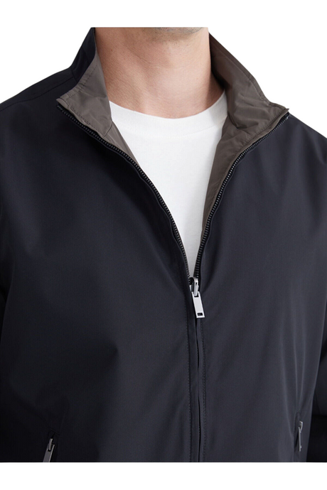 Sporline LC Waikiki siyah renkli, fermuarlı, regular kesim erkek polyester mont