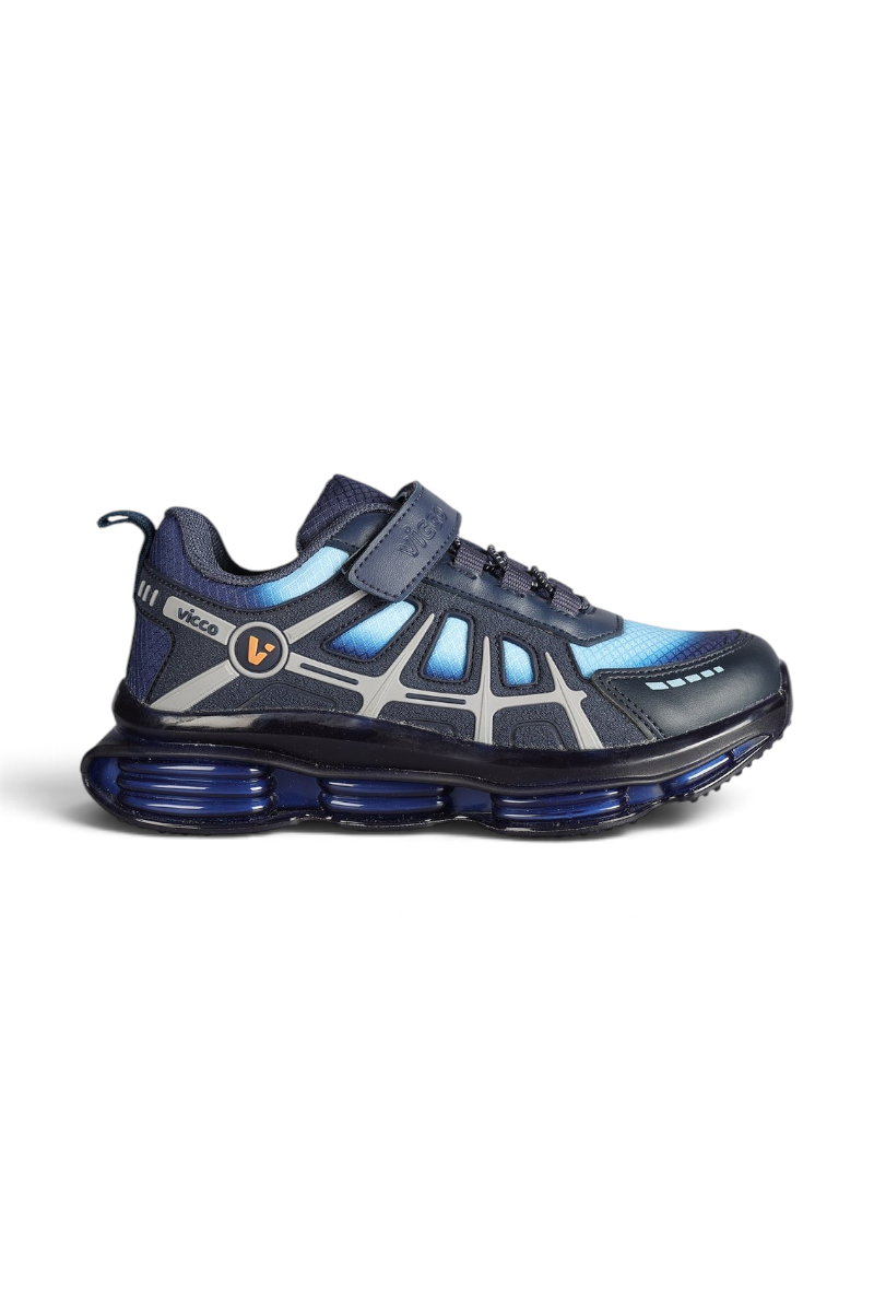 Sporline Vicco lacivert suni deri çocuk sneaker, yan profil görünümü ve şeffaf taban detaylı spor ayakkabı