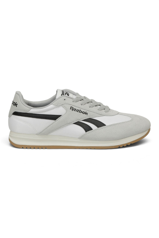 Sporline Reebok World 70 kadın beyaz sneaker, süet ve kumaş detaylı, yan kısımlarında siyah logo baskılı spor ayakkabı