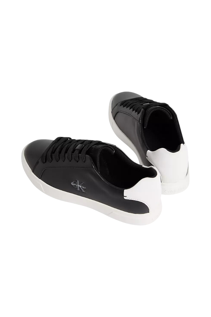 Sporline Calvin Klein siyah deri kadın sneaker, beyaz topuk detaylı ve yan tarafta marka logolu günlük ayakkabı