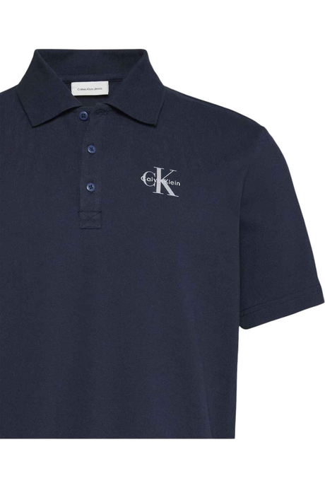 Sporline Calvin Klein lacivert renkli, %100 pamuklu, polo yaka erkek tişörtü, göğüs kısmında beyaz logo detaylı