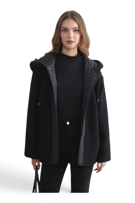 Sporline LC Waikiki siyah oversize teddy kaban, kapüşonlu ve çıtçıtlı tasarımıyla şık bir kışlık dış giyim modeli.