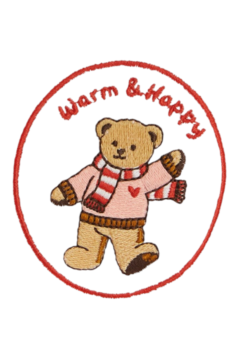 Sporline LC Waikiki pembe kadife kız çocuk pijama takımı üzerinde ayıcık figürlü nakış detayı