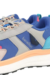 Sporline Benetton kadın sneaker, canlı mavi renkli, tekstil ve suni deri detaylı, modern spor ayakkabı tasarımı.