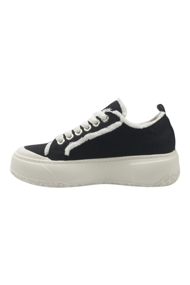 Sporline Lumberjack Veller siyah kadın sneaker, beyaz kürklü detaylara ve kalın tabanlı modern tasarıma sahip.