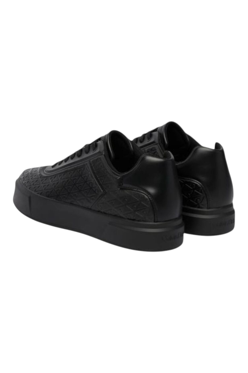 Sporline Calvin Klein siyah kadın sneaker, monogram desenli deri yüzey ve kalın taban tasarımı ile şık günlük ayakkabı