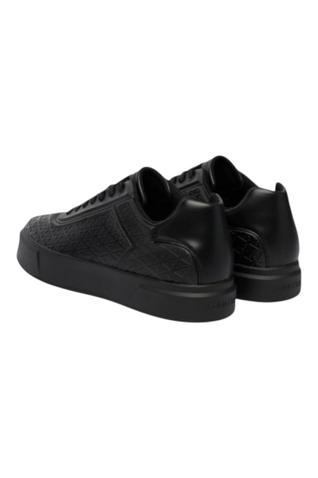 Sporline Calvin Klein siyah kadın sneaker, monogram desenli deri yüzey ve kalın taban tasarımı ile şık günlük ayakkabı