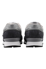 Sporline New Balance ML565AGG antrasit renkli, süet ve file detaylı unisex günlük spor ayakkabı arka görünümü