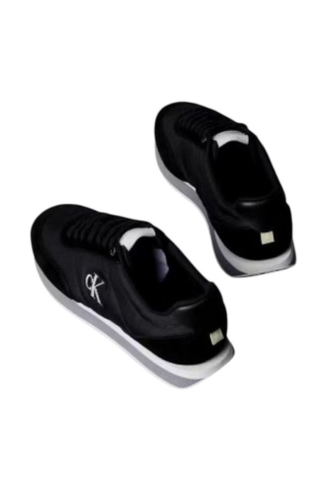 Sporline Calvin Klein siyah polyester erkek günlük ayakkabı, yan kısmında CK logolu modern tasarım.