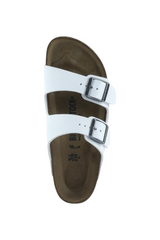 Sporline Birkenstock Arizona beyaz süet kadın terlik, çift tokalı tasarım ve anatomik taban yapısı ile.