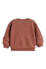 Sporline LC Waikiki soluk pembe renkli, fırfır detaylı, loose kesim pamuklu çocuk sweatshirt