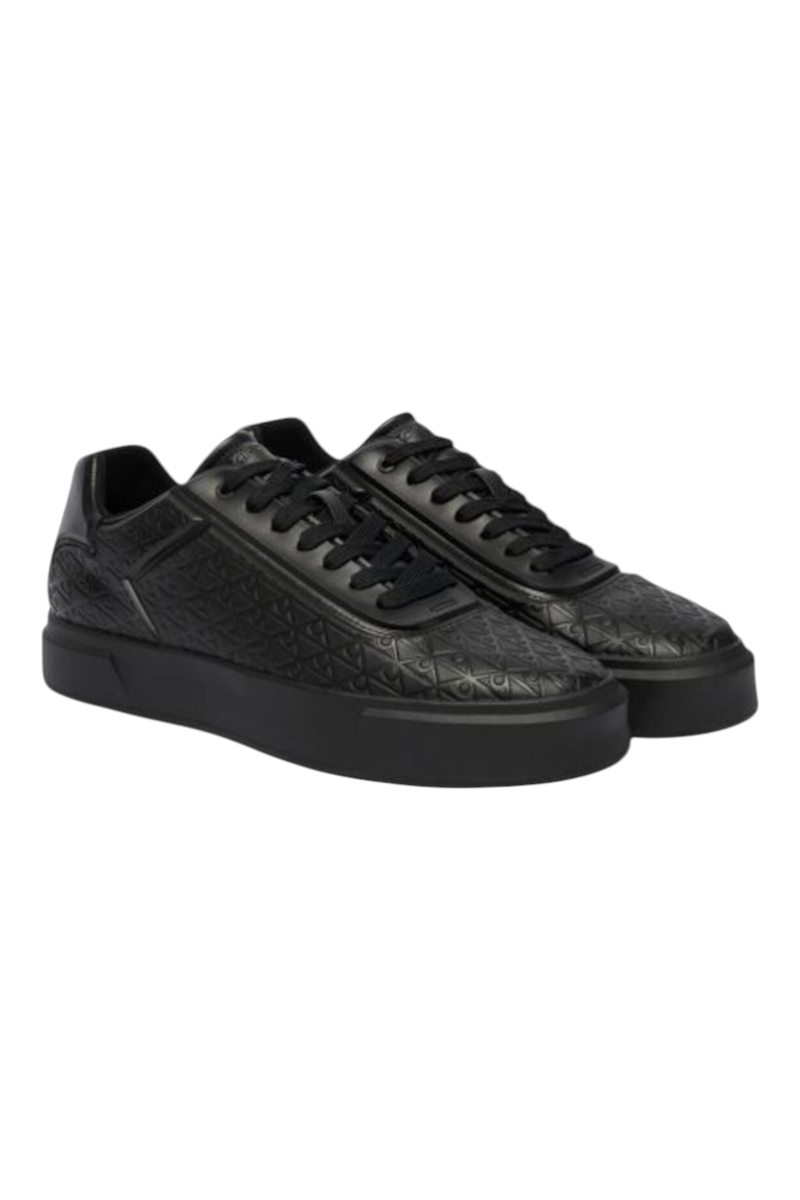 Sporline Calvin Klein siyah kadın sneaker, üzerinde kabartmalı monogram desenleri bulunan şık ve modern günlük ayakkabı.