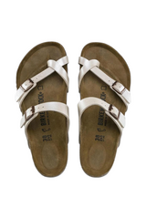 Sporline Birkenstock Mayari beyaz PU kadın terlik, parmak arası tasarımlı ve ayarlanabilir tokalı anatomik taban.