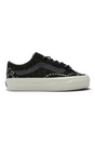 Sporline Vans LX Old Skool unisex sneaker, siyah, yeşil ve gri desenli tekstil yüzeyli, beyaz tabanlı spor ayakkabı.