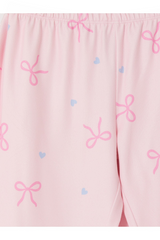 Sporline LC Waikiki kız çocuk pijama takımı, soluk pembe renkli, kurdele ve kalp desenli yumuşak kumaş detaylı