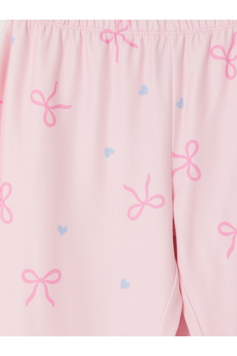 Sporline LC Waikiki kız çocuk pijama takımı, soluk pembe renkli, kurdele ve kalp desenli yumuşak kumaş detaylı