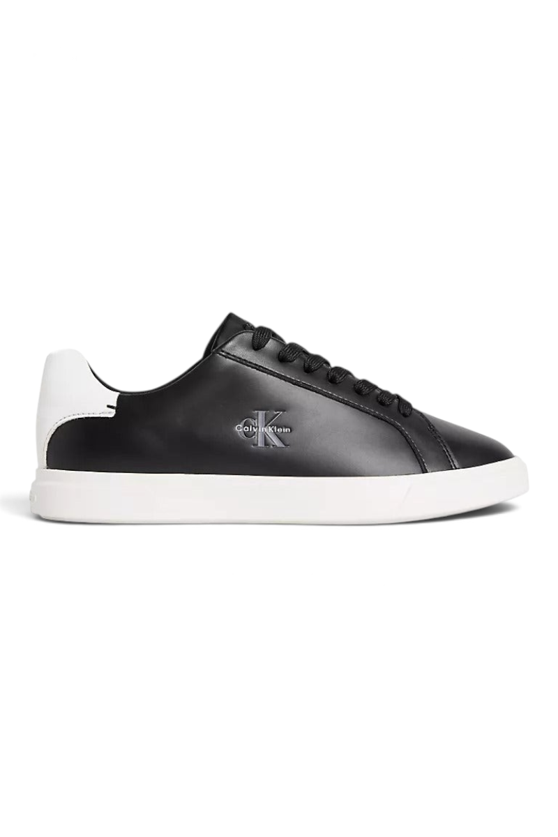 Sporline Calvin Klein siyah deri kadın sneaker, beyaz topuk detaylı ve yan tarafta gümüş marka logolu günlük ayakkabı