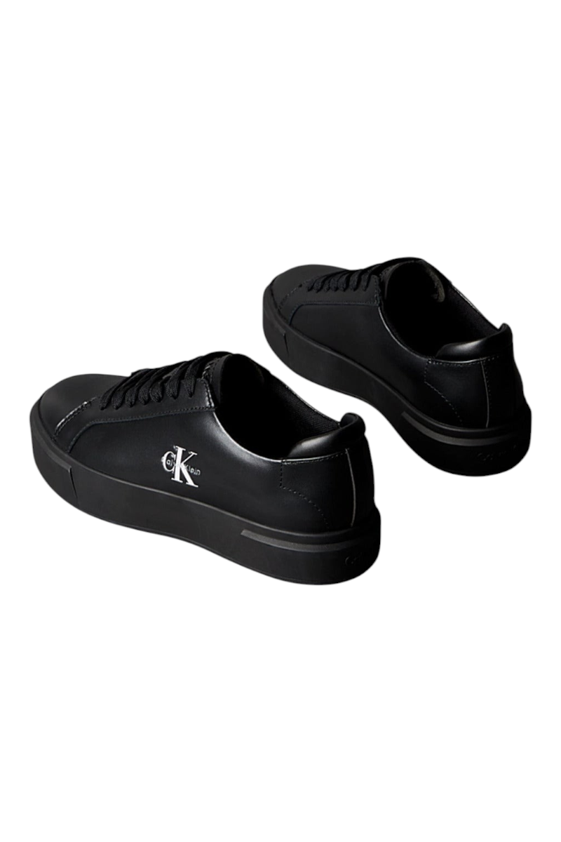 Sporline Calvin Klein siyah deri kadın sneaker, yan kısmında beyaz CK logo detayı ile