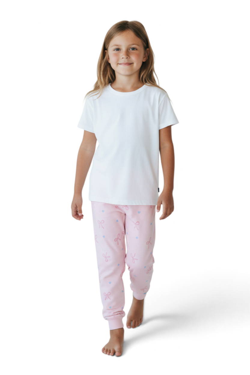 Sporline LC Waikiki kız çocuk bisiklet yaka beyaz tişört ve soluk pembe fiyonk desenli pijama altı takımı