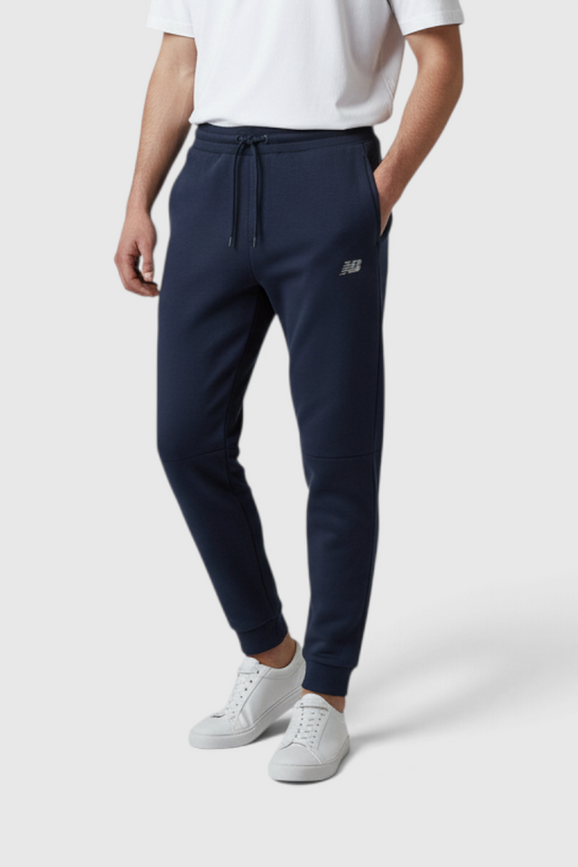 Sporline New Balance lacivert erkek eşofman altı, regular kesim, polyester karışımlı, bağcıklı bel detaylı