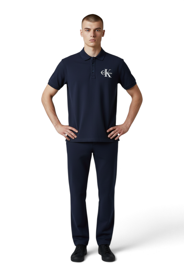 Sporline Calvin Klein erkek lacivert polo yaka tişört, %100 pamuklu, comfort kesim, göğüs kısmında logo detaylı.