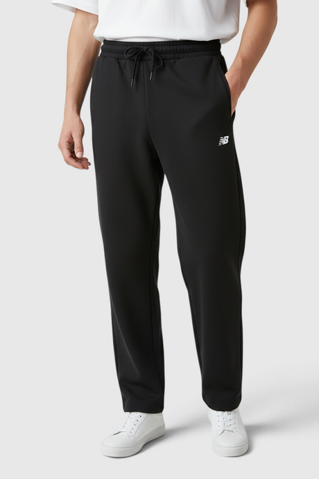 Sporline New Balance antrasit renkli, jogger kesim, tekstil malzemeden üretilmiş unisex eşofman altı