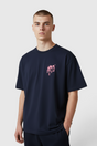 Sporline New Balance lacivert unisex pamuklu regular kesim tişört, göğüs kısmında pembe damla desenli logo baskılı