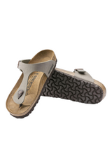 Sporline Birkenstock Gizeh kadın parmak arası terlik, kum beji renginde, mantar tabanlı ve ayarlanabilir tokalı tasarım