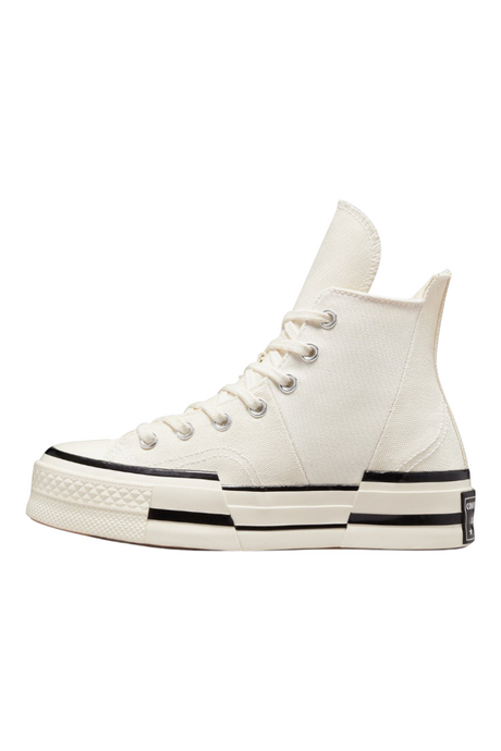 Sporline Converse Chuck 70 Plus bej kanvas yüksek tabanlı sneaker, asimetrik tasarımlı ve siyah detaylı