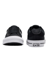 Sporline Converse siyah kanvas sneaker, beyaz kauçuk tabanlı, bağcıklı ve minimalist tasarımlı unisex spor ayakkabı