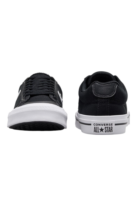 Sporline Converse siyah kanvas sneaker, beyaz kauçuk tabanlı, bağcıklı ve minimalist tasarımlı unisex spor ayakkabı