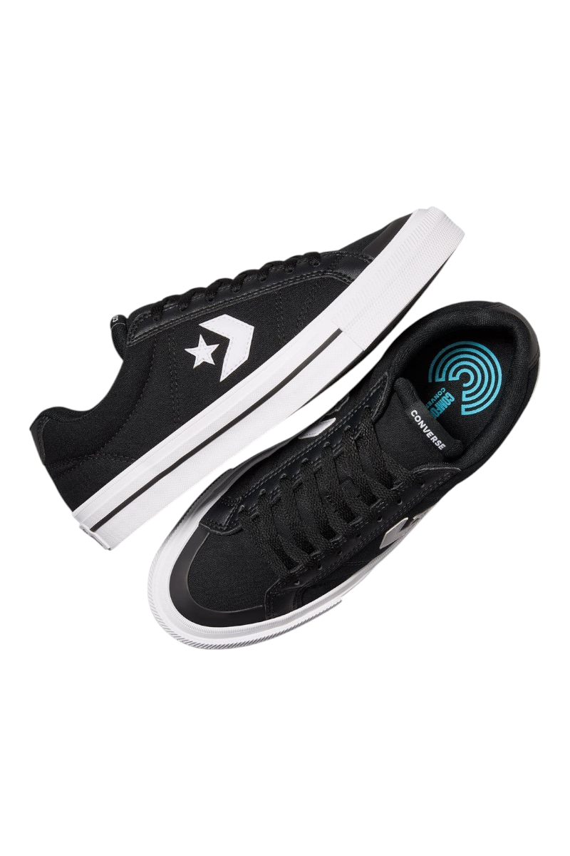 Sporline Converse Cons siyah kanvas sneaker, beyaz tabanlı ve yan kısımlarında ikonik yıldız logolu unisex ayakkabı.
