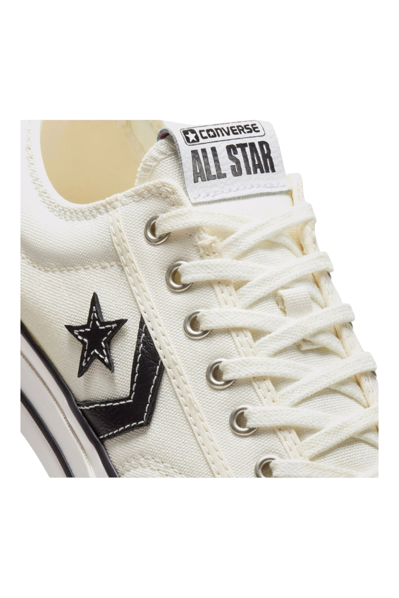 Sporline Converse Star Player 76 eskitilmiş beyaz kanvas erkek spor ayakkabı, siyah yıldız detaylı ve bağcıklı tasarım