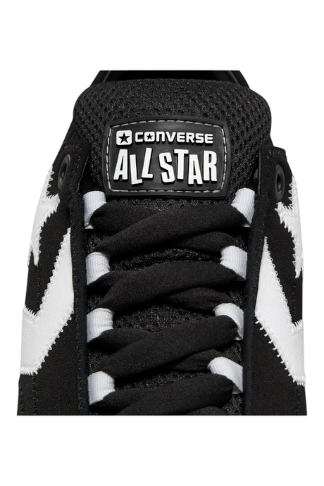 Sporline Converse Star Player Puff siyah deri spor ayakkabı, dildeki ikonik All Star logosu ve geniş bağcık detayı.