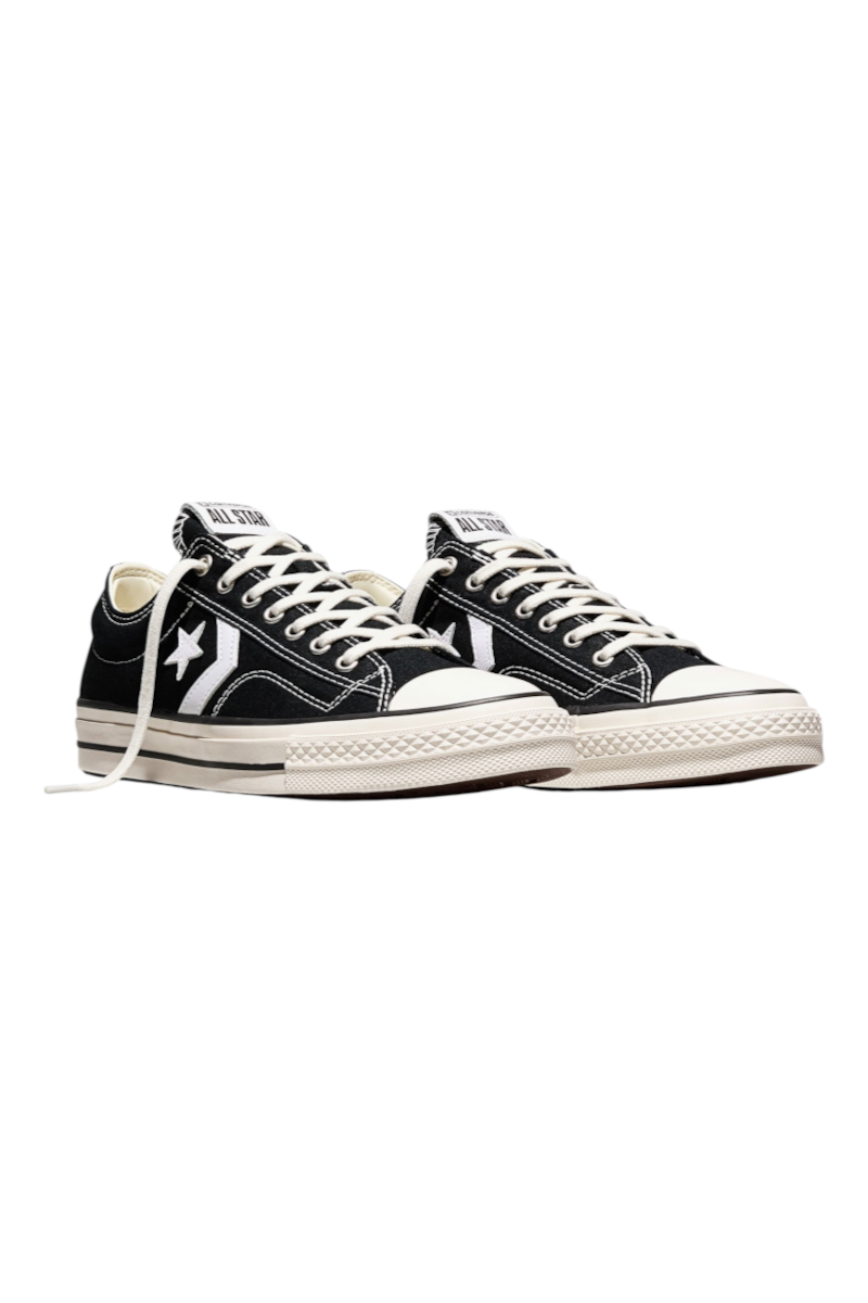 Sporline Converse Star Player 76 siyah beyaz tekstil spor ayakkabı, kauçuk tabanlı ve ikonik yıldız logolu tasarım.