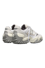 Sporline Converse Wave Motion krem rengi süet unisex sneaker, dalgalı taban yapısı ve topuk detaylı arka görünüm