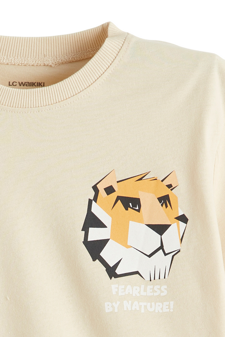 Sporline LC Waikiki ekru renkli, kaplan baskılı ve Fearless By Nature yazılı çocuk kısa kollu t-shirt