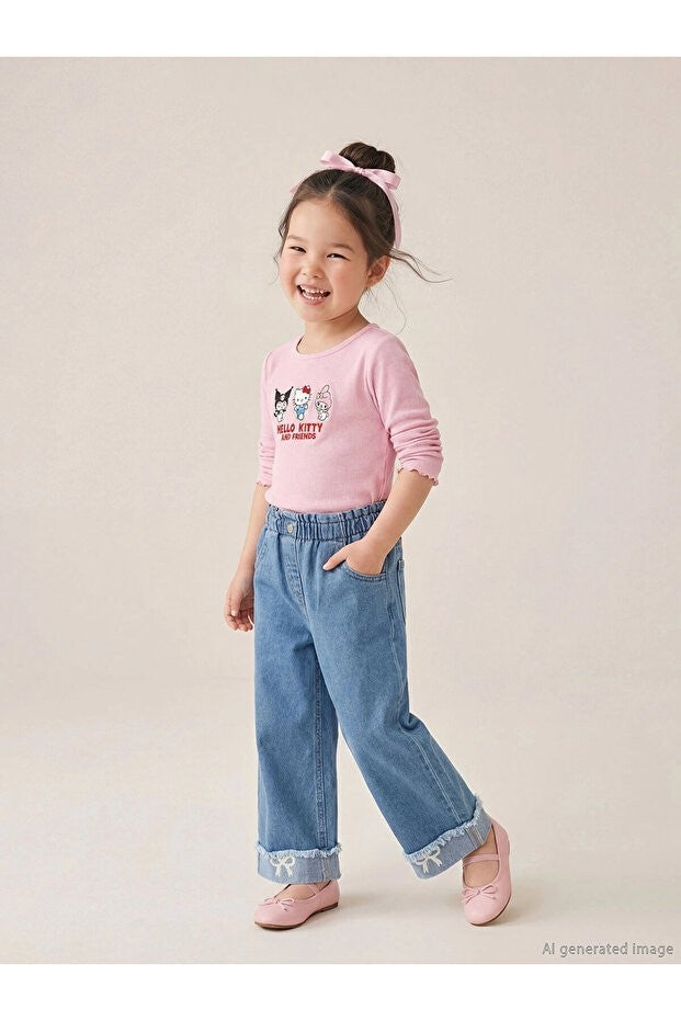 Sporline LC Waikiki indigo mavi renkli, taş işlemeli ve geniş paçalı kız çocuk denim pantolon